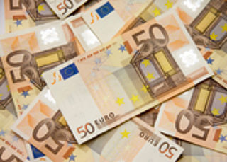 Betrapte oplichter strooit met geld