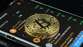 Zestal aangehouden om miljoenenoplichting met cryptogeld